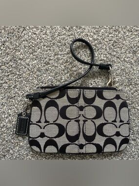 Coach Signature Canvas Wristlet in Black and Tan